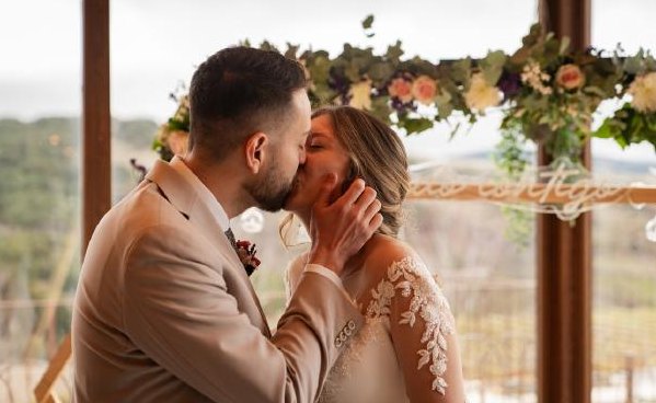 Wedding kiss at the altar